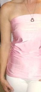 Shiny pink strapless top. Tags on. Size small.